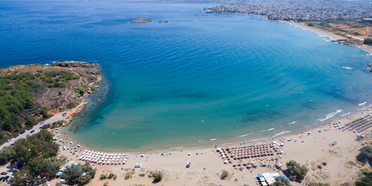 Golden bay beach with turquoise water and its long golden shore