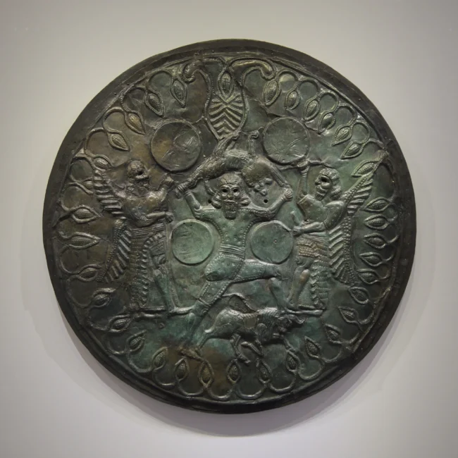 Ideon Cave: Bronze shield picturing Zeus and Kouretes