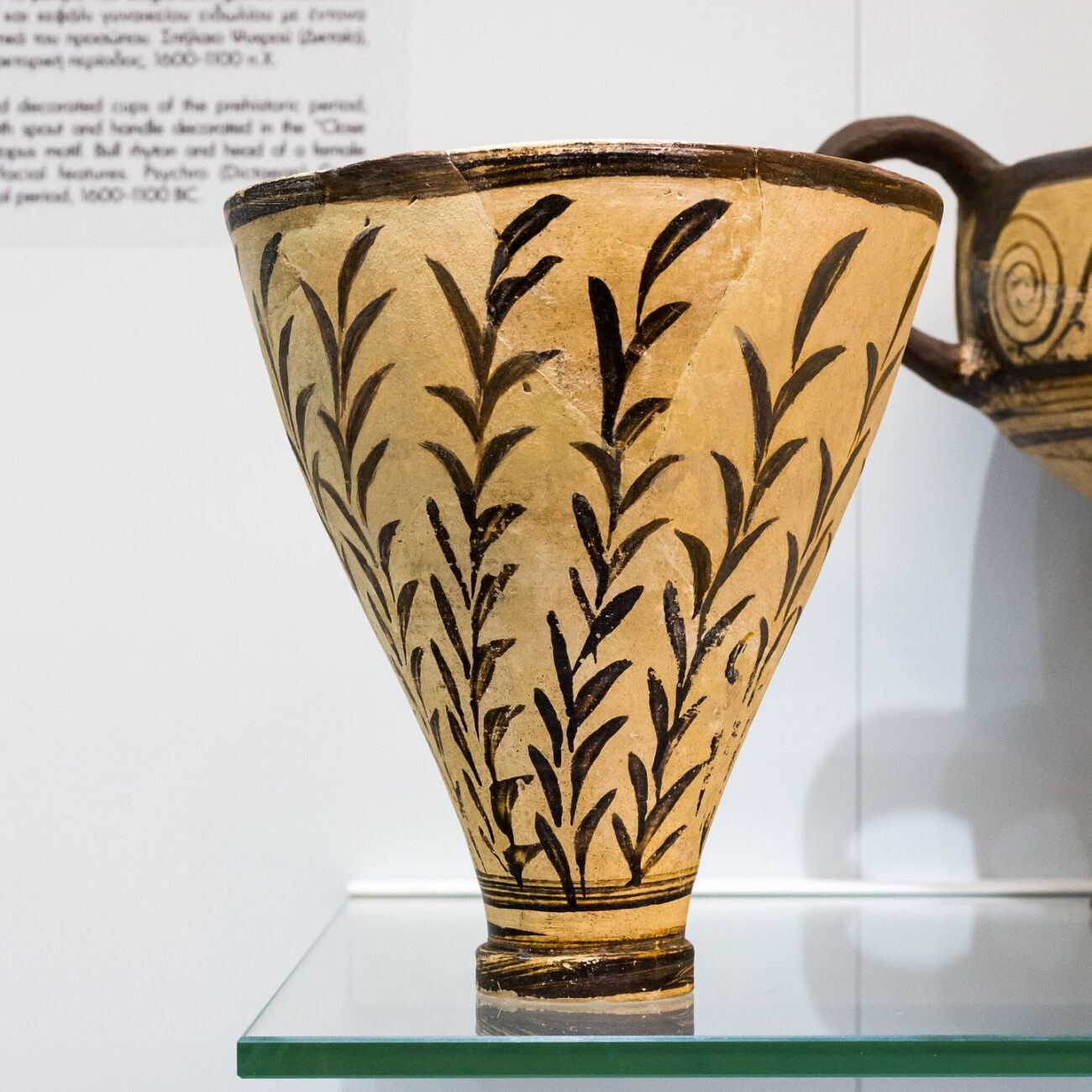 Dikteon Cave: A floral-style conical cup from the late Minoan period, found in Dikteon, and it is in display in the Archeological Museum of Heraklion