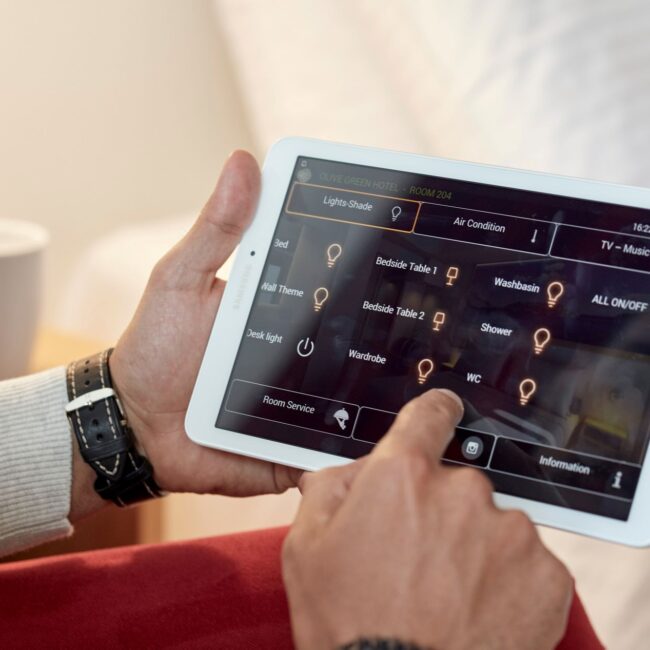 Olive Green Hotel: The tablet located in every room to adjust temperature, lighting, to set your TV and for your personal use