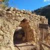 Mili Gorge: The arch marking the Kato MIli Neighborhood